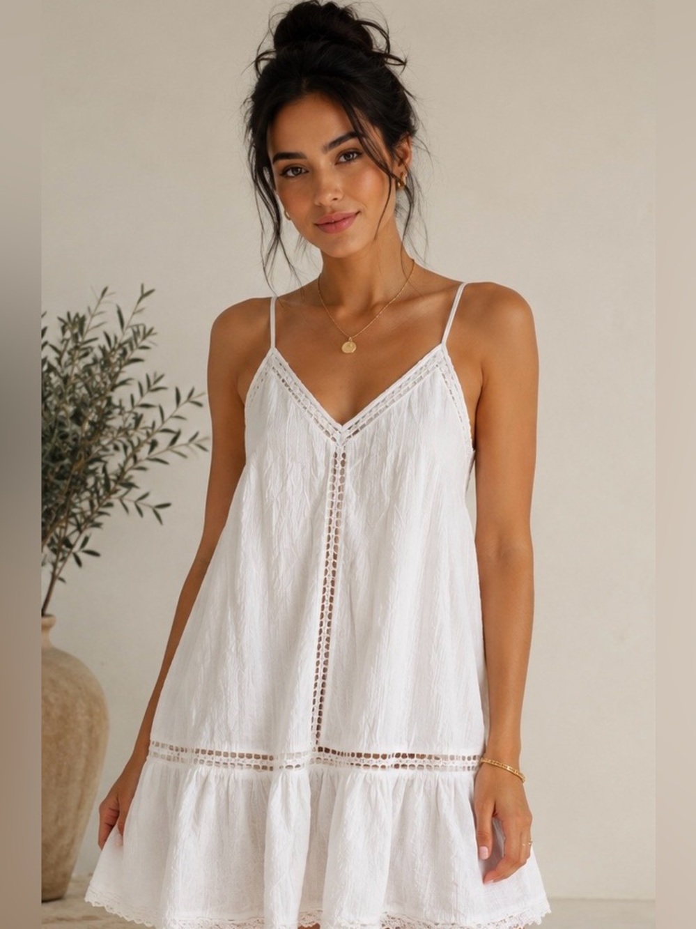 This Cupcakes & Cashmere white boho midi dress features delicate crochet trim